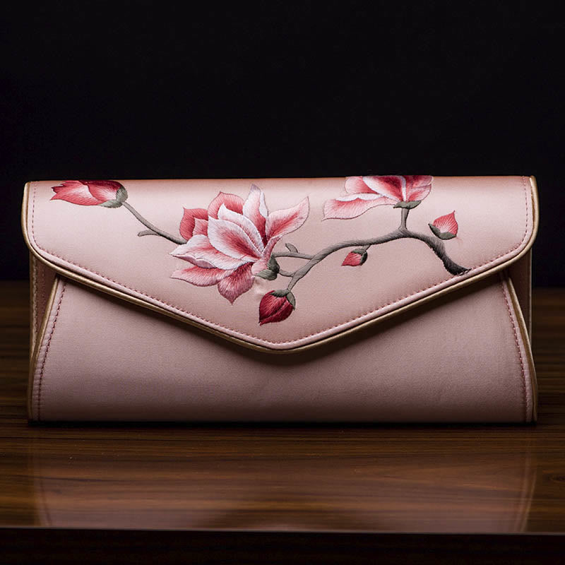 Bolso de mano con bordado de magnolia y Buddha Stones para bodas