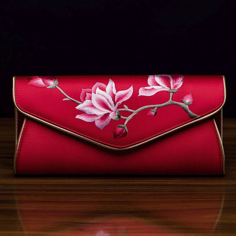 Bolso de mano con bordado de magnolia y Buddha Stones para bodas