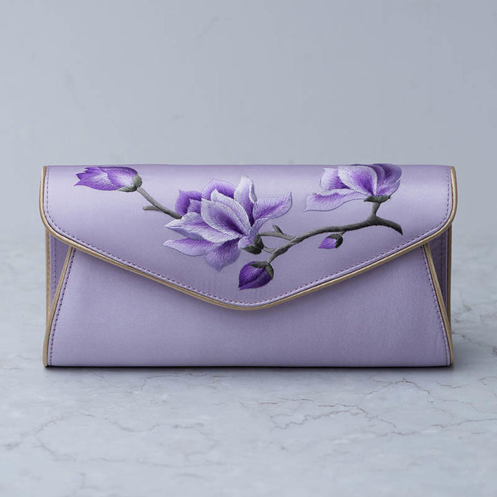 Bolso de mano con bordado de magnolia y Buddha Stones para bodas
