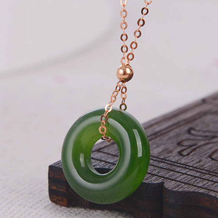 Colgante de collar de oro de 14 quilates curativo de jade cian redondo