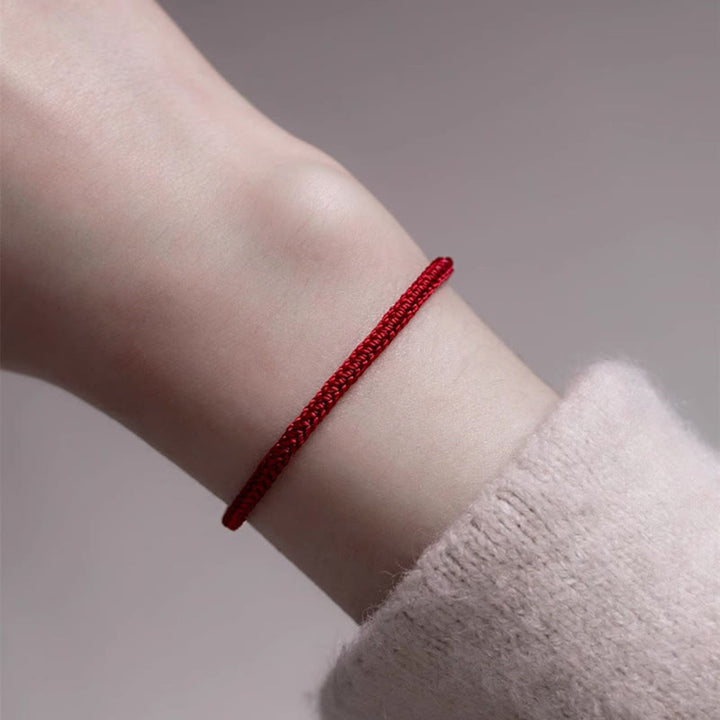 Pulsera de jade con hilo rojo y Buddha Stones