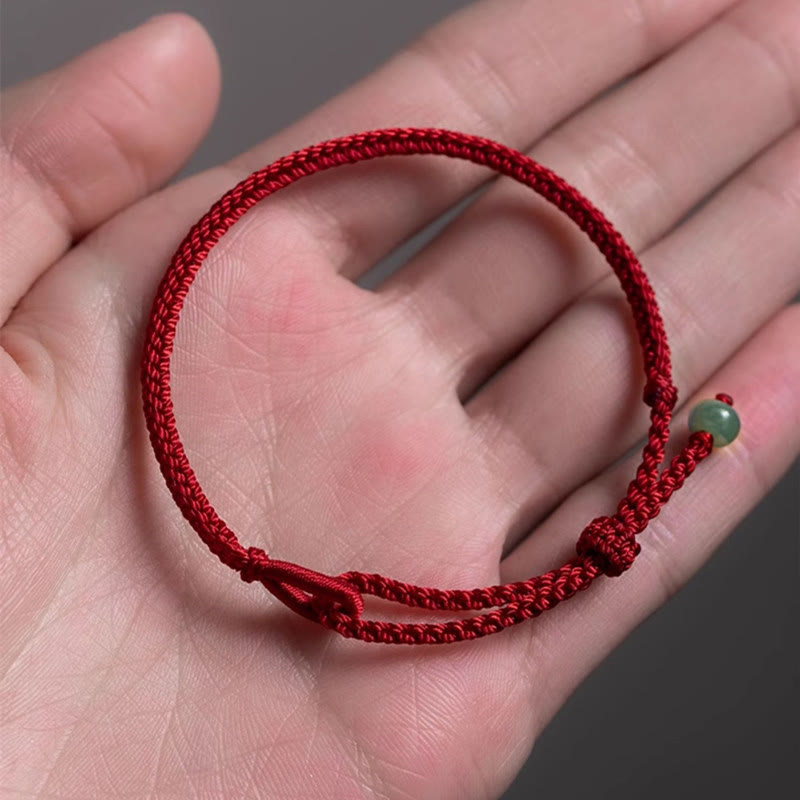 Pulsera de jade con hilo rojo y Buddha Stones