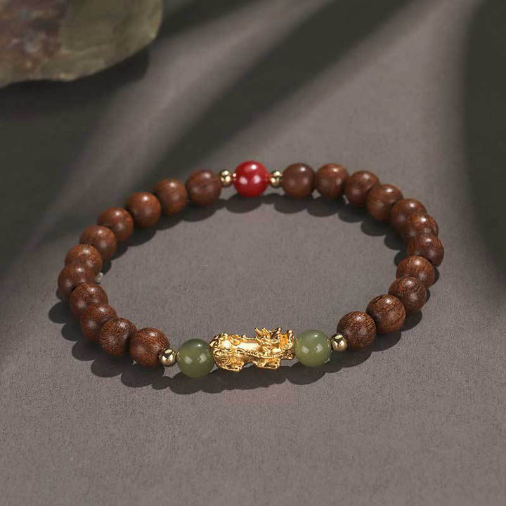 Pulsera de la riqueza PiXiu con hojas pequeñas de sándalo, ébano, sándalo rojo, jade hetiano, cinabrio y Buddha Stones en plata de ley 999