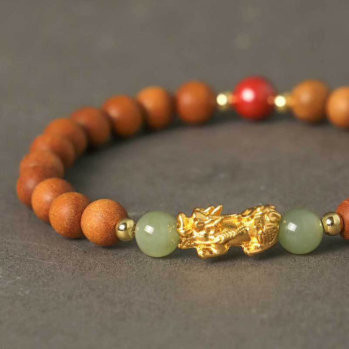 Pulsera de la riqueza PiXiu con hojas pequeñas de sándalo, ébano, sándalo rojo, jade hetiano, cinabrio y Buddha Stones en plata de ley 999