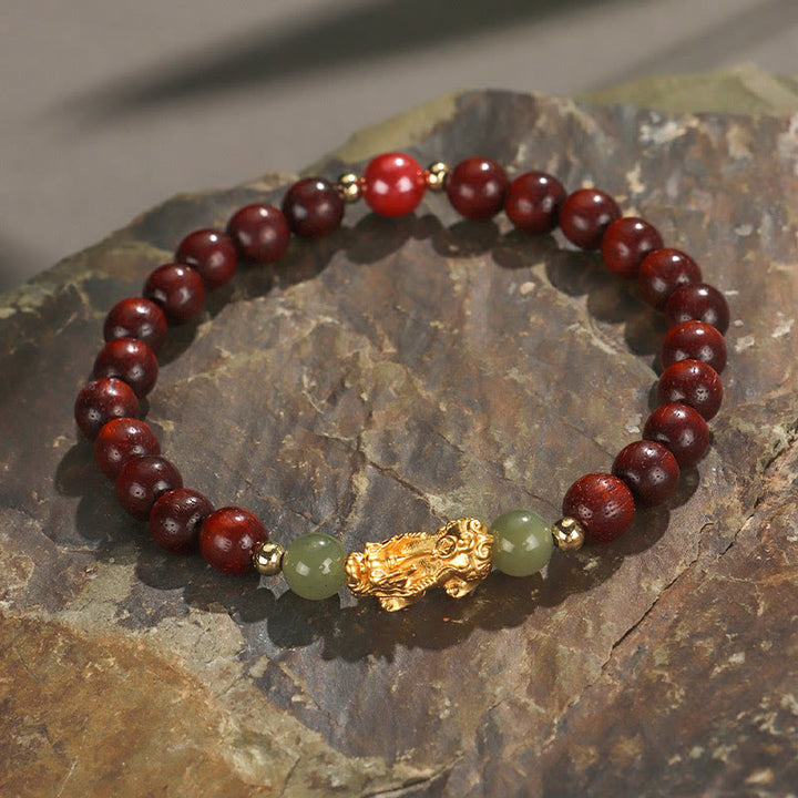 Pulsera de la riqueza PiXiu con hojas pequeñas de sándalo, ébano, sándalo rojo, jade hetiano, cinabrio y Buddha Stones en plata de ley 999