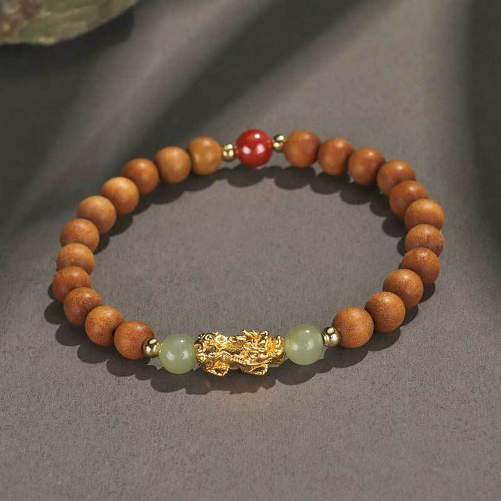 Pulsera de la riqueza PiXiu con hojas pequeñas de sándalo, ébano, sándalo rojo, jade hetiano, cinabrio y Buddha Stones en plata de ley 999