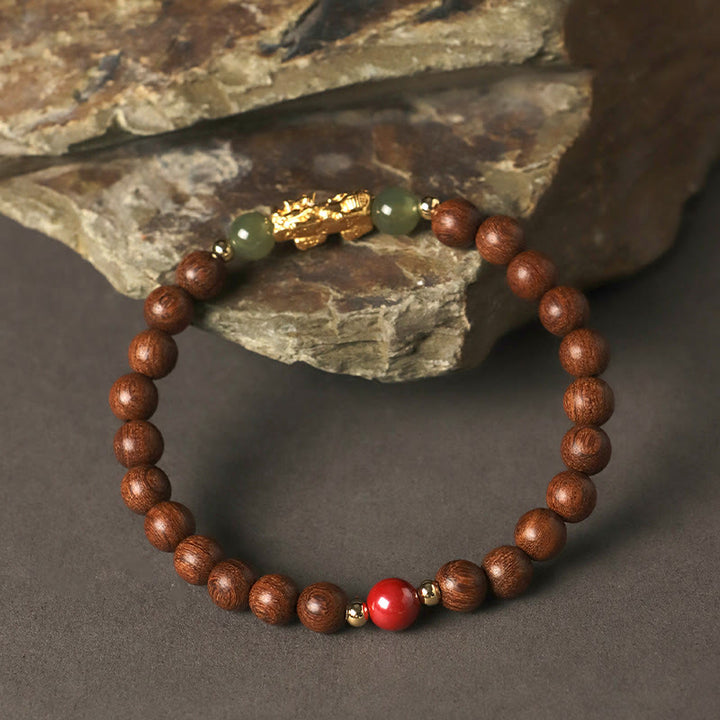 Pulsera de la riqueza PiXiu con hojas pequeñas de sándalo, ébano, sándalo rojo, jade hetiano, cinabrio y Buddha Stones en plata de ley 999