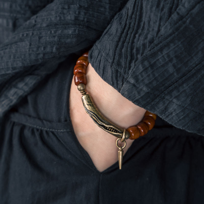 Pulsera de fuerza con colgante de cono de cobre y cuentas de hueso de Buddha Stones