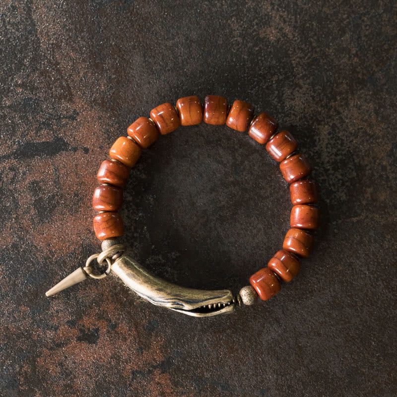 Pulsera de fuerza con colgante de cono de cobre y cuentas de hueso de Buddha Stones