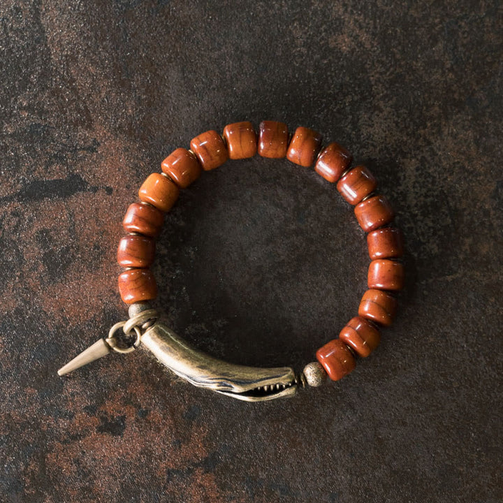 Pulsera de fuerza con colgante de cono de cobre y cuentas de hueso de Buddha Stones
