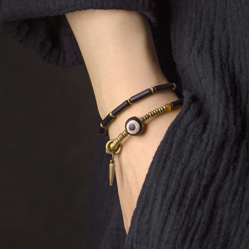 Pulsera protectora de doble vuelta con colgante de cono de cuentas Dzi de cobre y ónix negro y Buddha Stones