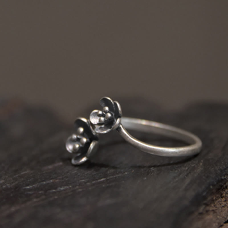 Anillo de flores de plata de ley 925 con Buddha Stones