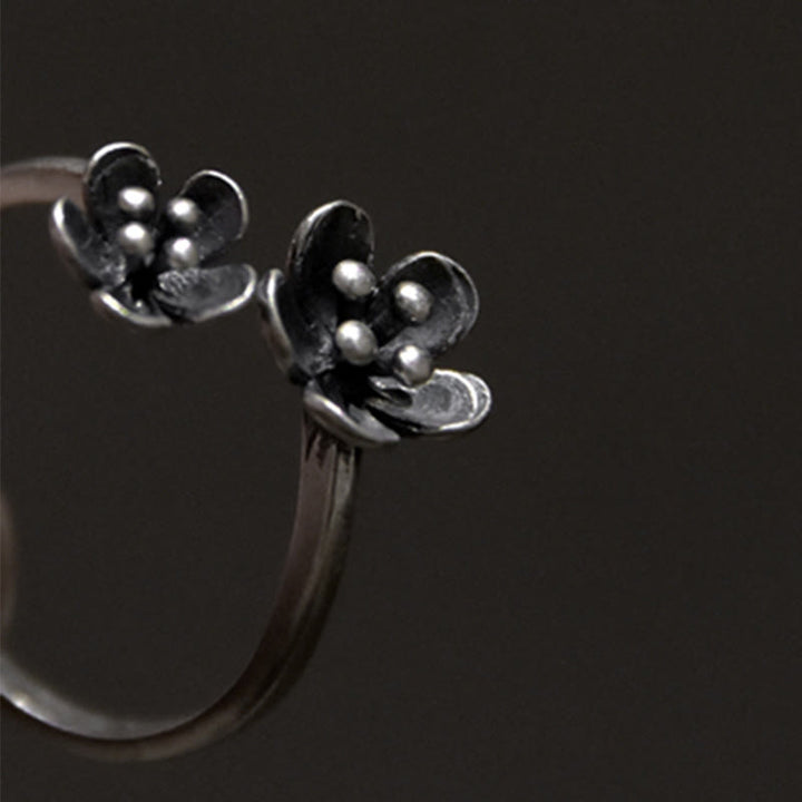 Anillo de flores de plata de ley 925 con Buddha Stones