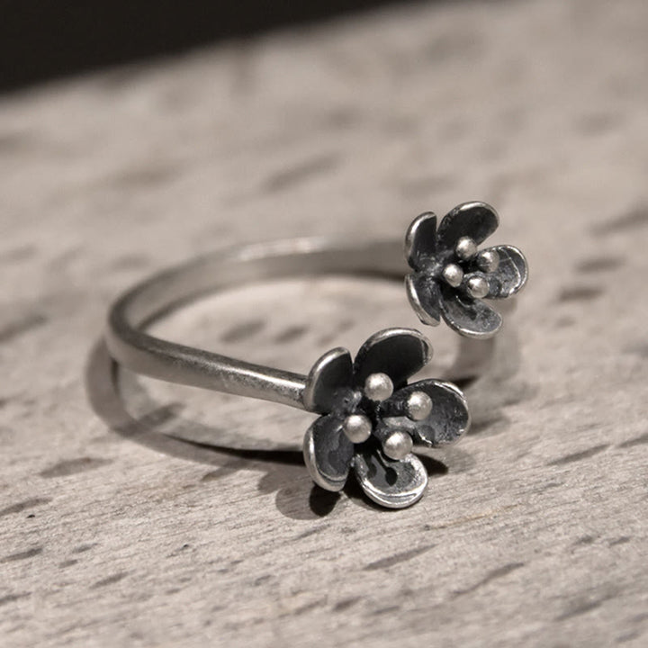 Anillo de flores de plata de ley 925 con Buddha Stones