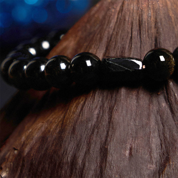 Pulsera de riqueza con turmalina negra y obsidiana con brillo dorado y Buddha Stones
