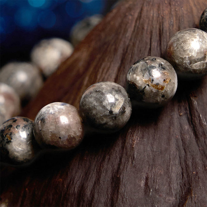 Pulsera creativa de yooperlita con Buddha Stones