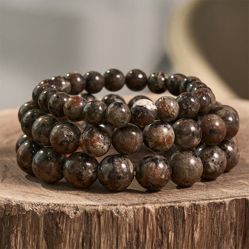Pulsera creativa de yooperlita con Buddha Stones