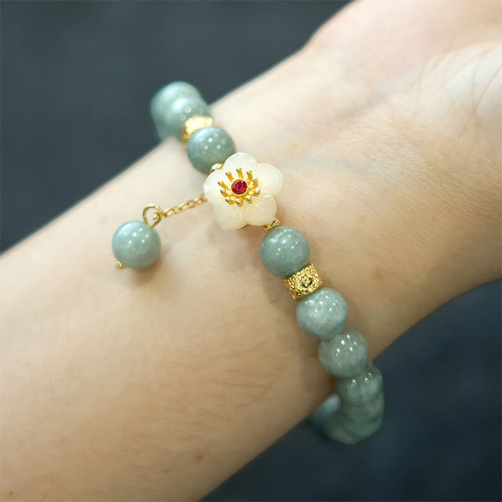 Pulsera de jade con flor de abundancia y Buddha Stones