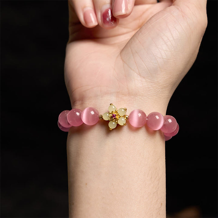 Pulsera de amor con flor de crisoberilo y ojo de gato con Buddha Stones