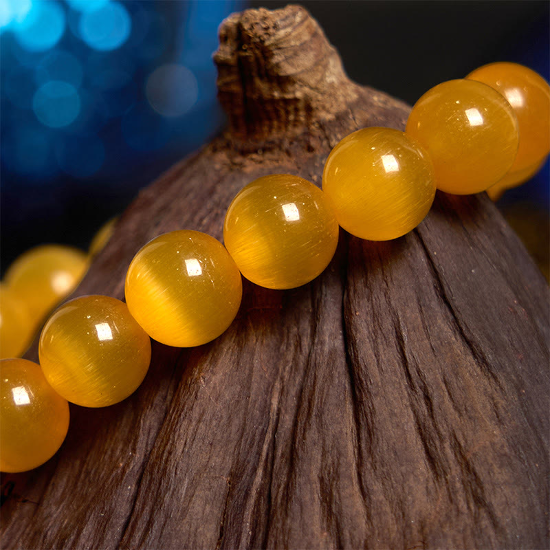 Pulsera de amor con flor de crisoberilo y ojo de gato con Buddha Stones