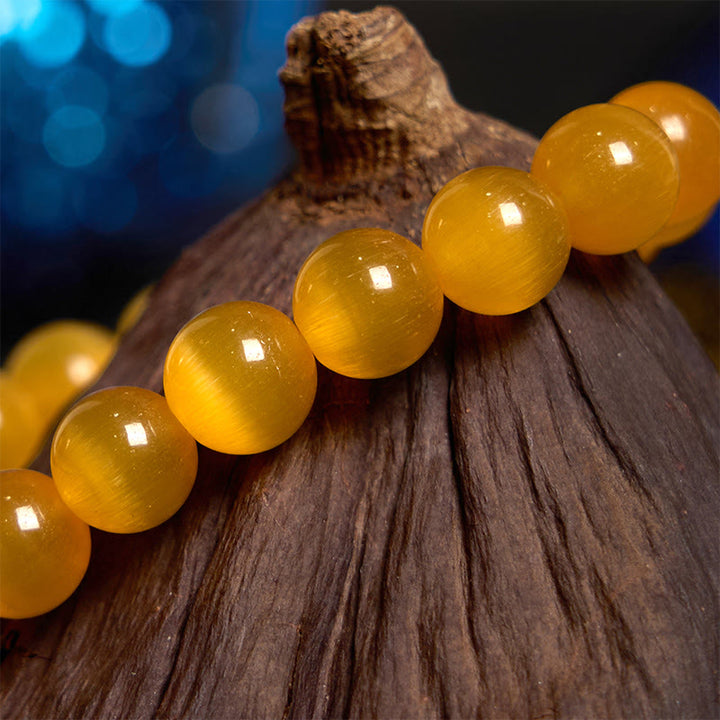 Pulsera de amor con flor de crisoberilo y ojo de gato con Buddha Stones