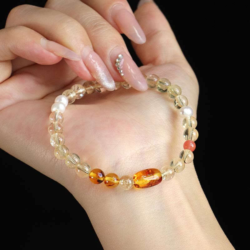 Pulsera de protección de cristal blanco con topacio, citrino y perla natural de Buddha Stones