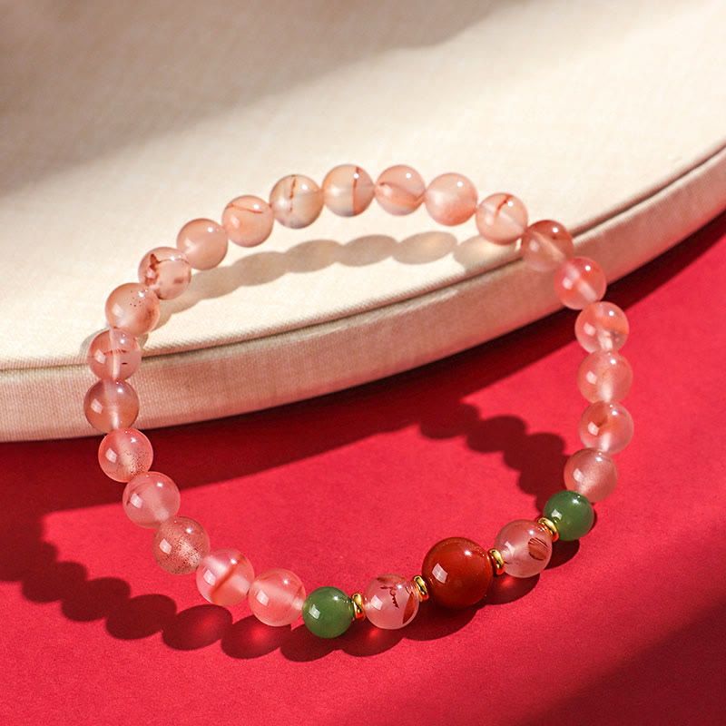 Buddha Stones, ágata roja del sur, orquídea mariposa y jade hetiano