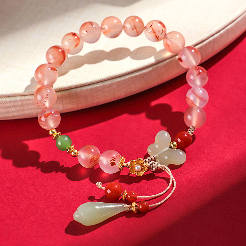 Buddha Stones, ágata roja del sur, orquídea mariposa y jade hetiano