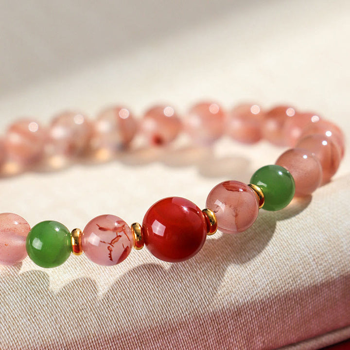 Buddha Stones, ágata roja del sur, orquídea mariposa y jade hetiano