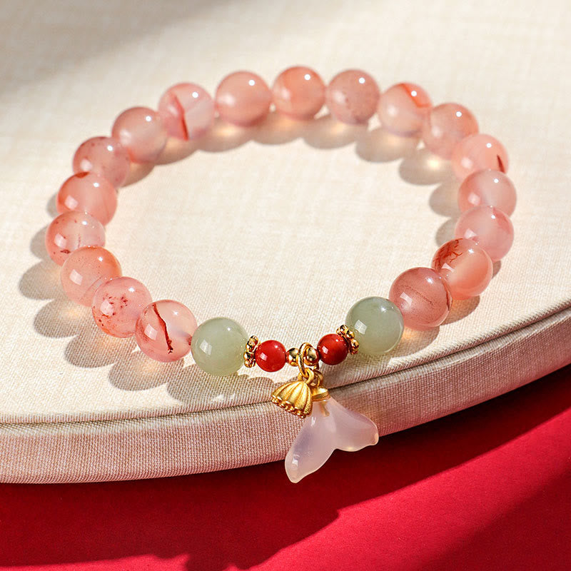 Buddha Stones, ágata roja del sur, orquídea mariposa y jade hetiano