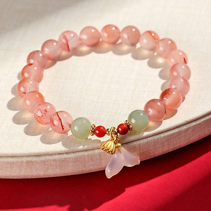 Buddha Stones, ágata roja del sur, orquídea mariposa y jade hetiano