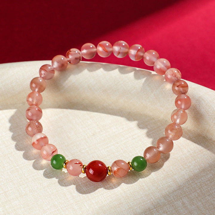 Buddha Stones, ágata roja del sur, orquídea mariposa y jade hetiano