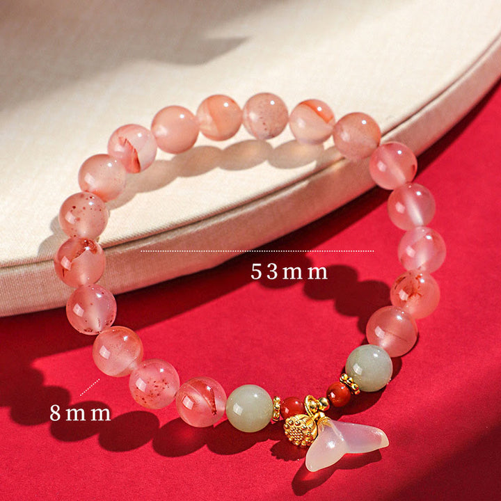 Buddha Stones, ágata roja del sur, orquídea mariposa y jade hetiano