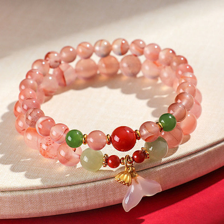 Buddha Stones, ágata roja del sur, orquídea mariposa y jade hetiano
