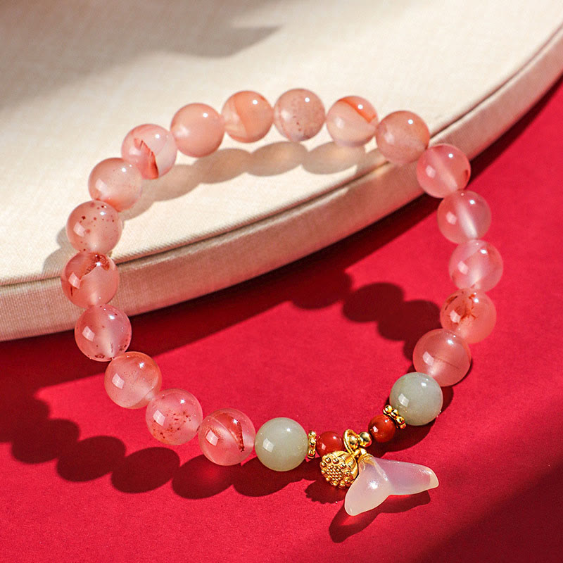 Buddha Stones, ágata roja del sur, orquídea mariposa y jade hetiano