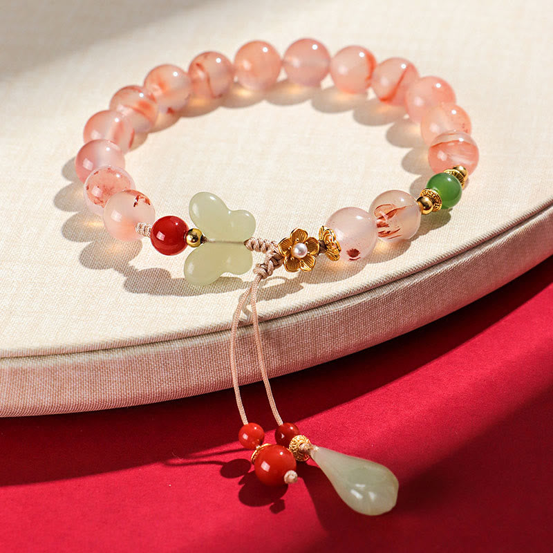 Buddha Stones, ágata roja del sur, orquídea mariposa y jade hetiano