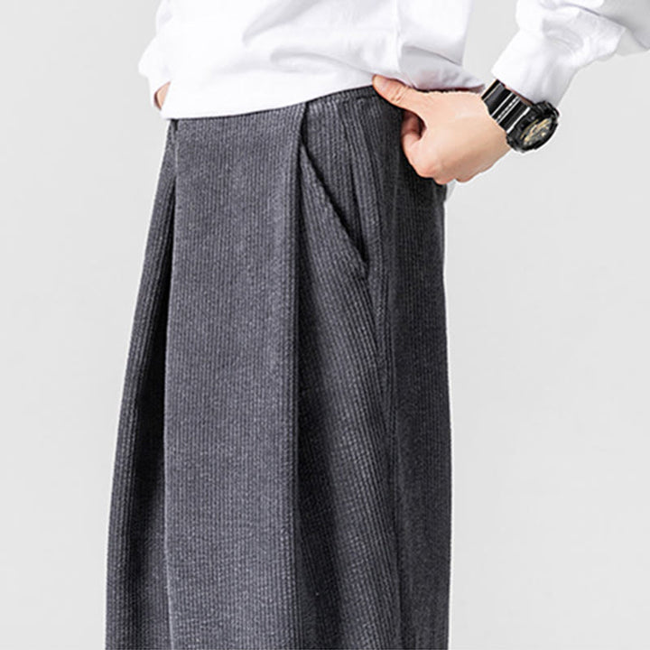 Pantalones anchos de pana de algodón de color liso para hombre con bolsillos y Buddha Stones