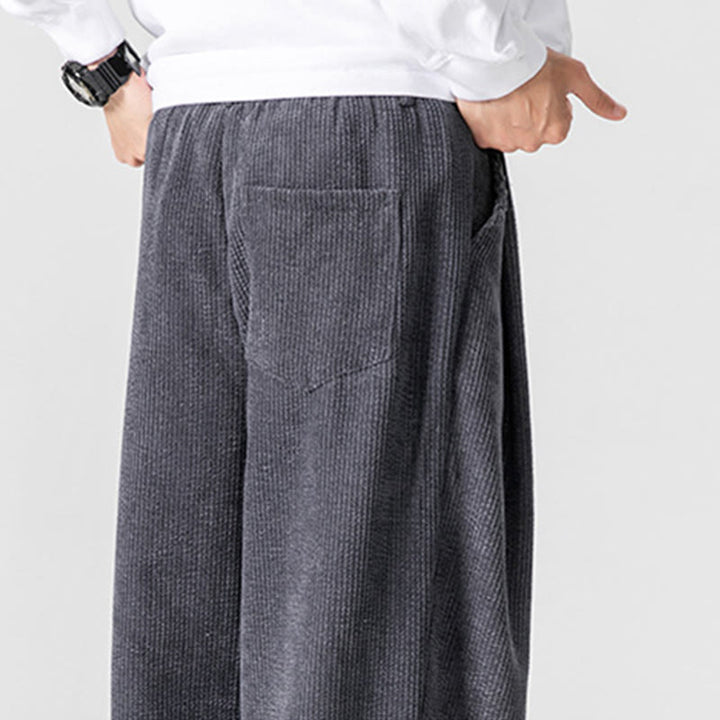 Pantalones anchos de pana de algodón de color liso para hombre con bolsillos y Buddha Stones