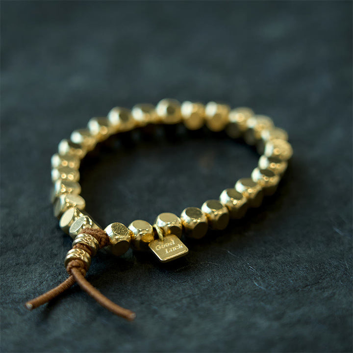 Pulsera de la suerte con hilo de cobre y Buddha Stones para el cuidado personal