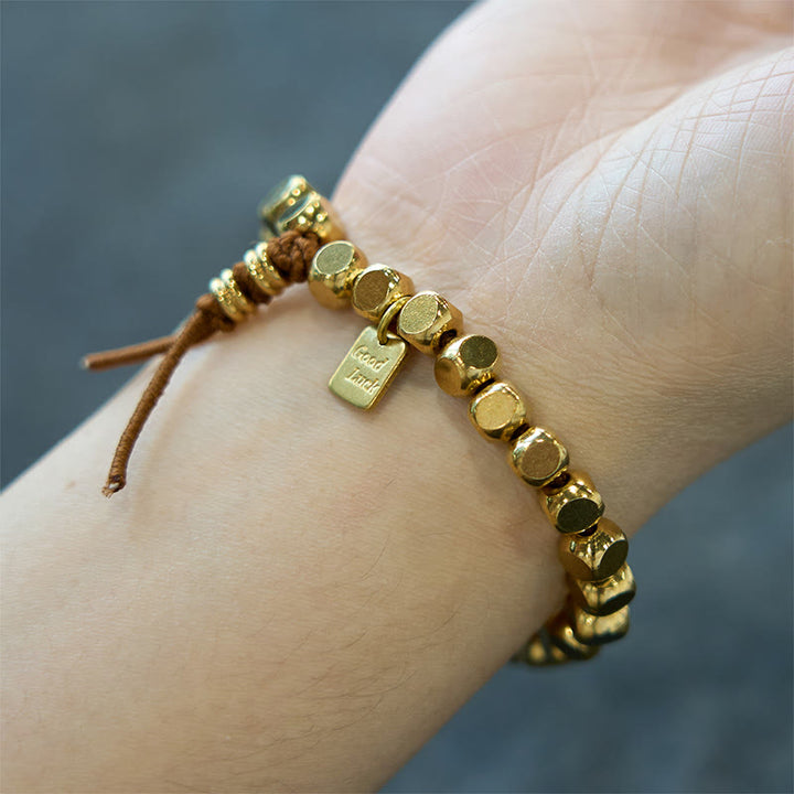 Pulsera de la suerte con hilo de cobre y Buddha Stones para el cuidado personal