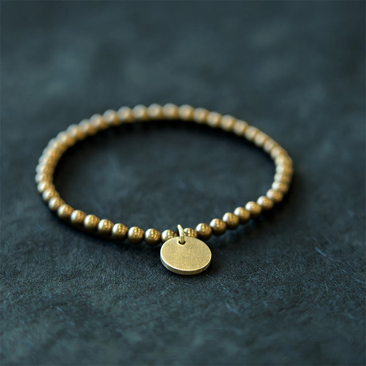 Pulsera de equilibrio de cobre Amekaji con Buddha Stones