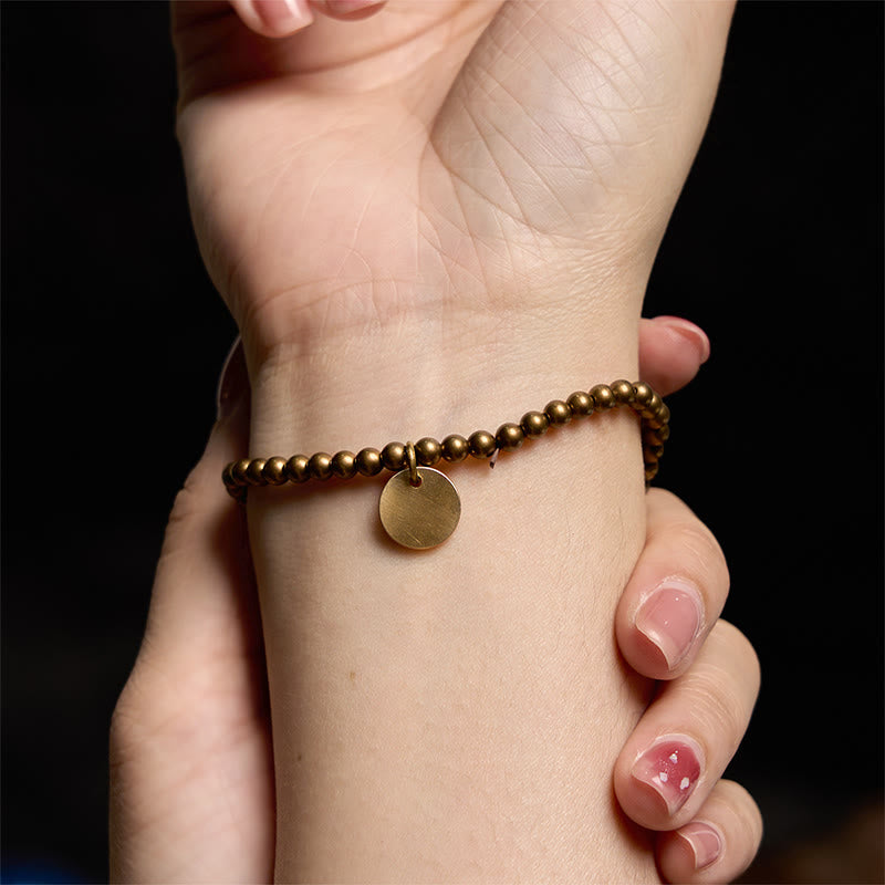 Pulsera de equilibrio de cobre Amekaji con Buddha Stones