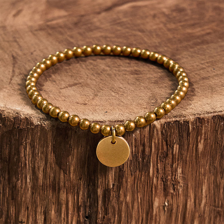 Pulsera de equilibrio de cobre Amekaji con Buddha Stones
