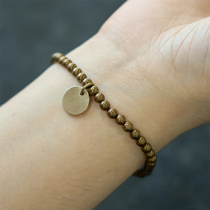Pulsera de equilibrio de cobre Amekaji con Buddha Stones