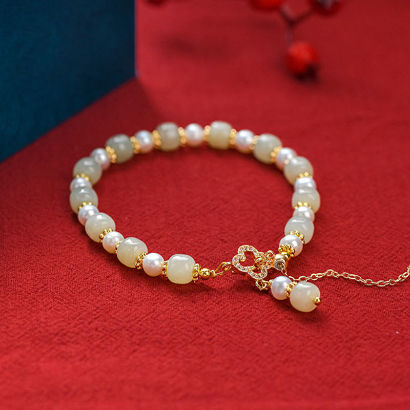Pulsera de la abundancia con colgante de trébol de cuatro hojas de aleación de perla de jade hetiano y Buddha Stones