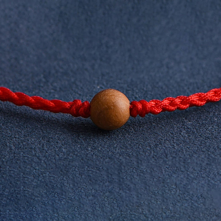 Pulsera trenzada con cuentas de madera de melocotón natural y Buddha Stones que alejan a los malos espíritus - image 11