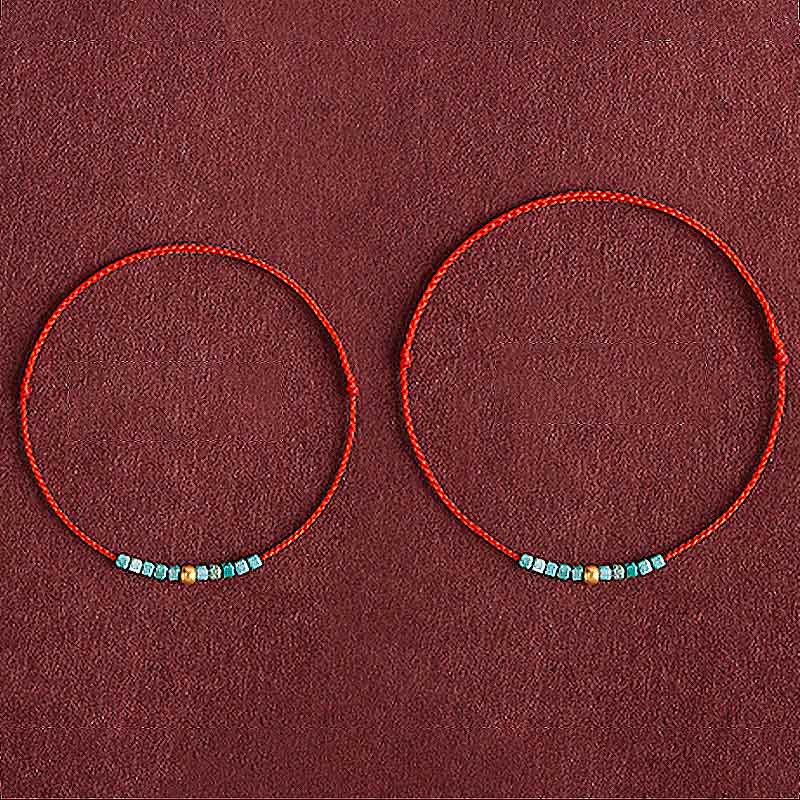 Pulsera trenzada con protección turquesa y cuentas de oro 999 de Buddha Stones
