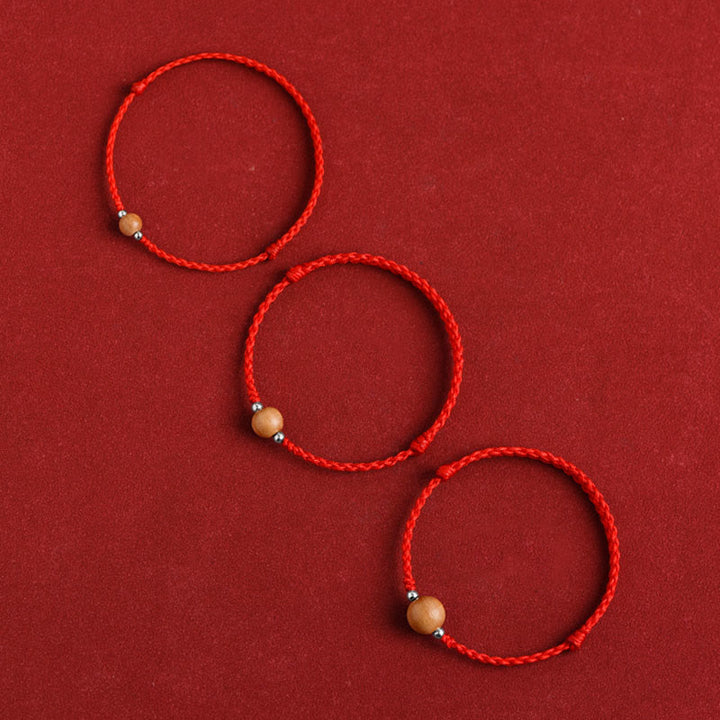 Pulsera trenzada de madera de melocotón natural con Buddha Stones y cuentas de suerte para tobillos