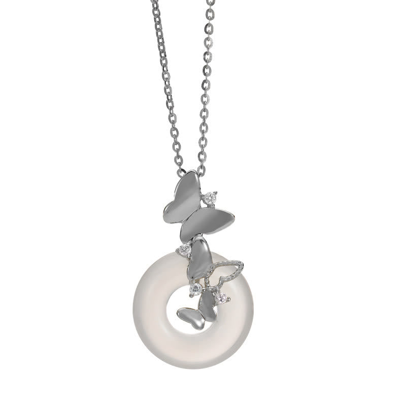 Colgante de plata de Buddha Stones 925 con forma de mariposa y calcedonia, con hebilla de paz y bendición de la suerte