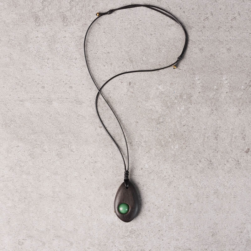 Buddha Stones Collar con colgante de paz y calma con aventurina verde y madera de ébano